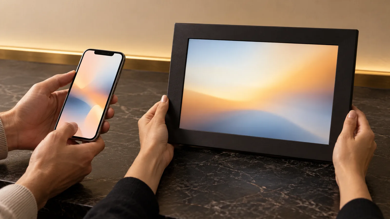 Hands testing a Wi-Fi digital photo frame and smartphone during secure first-time onboarding